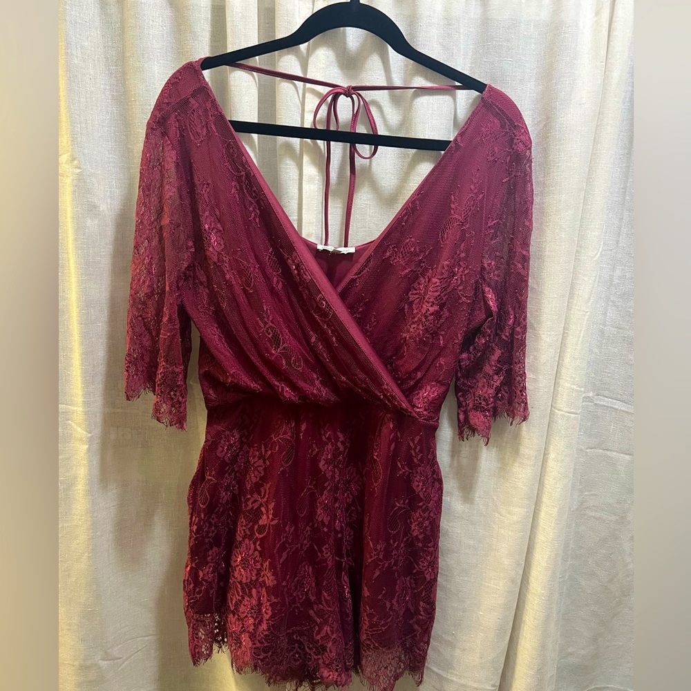 Plum colored lace romper.